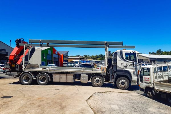 elevate_crane_truck_services_steel_beam_haulage